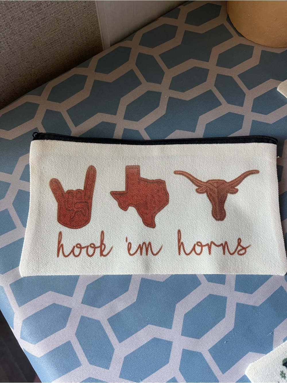 Hook 'Em Horns White Canvas Zip Pouch with Rust Graphics